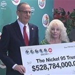 Florida Couple claim share of $1.6 billion Jackpot!